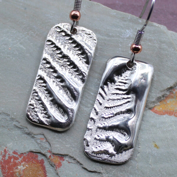 molten metal fern earrings