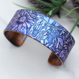 Handmade copper Longhorn Skull and Prairie Flowers Bracelet with an etched longhorn skull design inspired by open landscapes and western heritage.