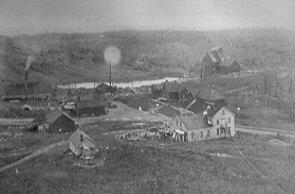 Historic buildings and mine structures from the 19th-century Minesota Mine in Ontonagon County, Michigan.
